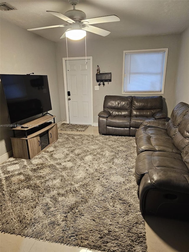 living room with ceiling fan