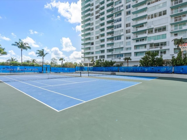 view of sport court featuring basketball hoop