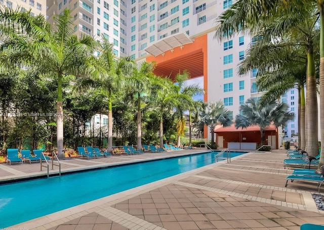 view of swimming pool featuring a patio