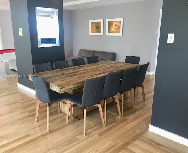 dining space featuring light hardwood / wood-style flooring