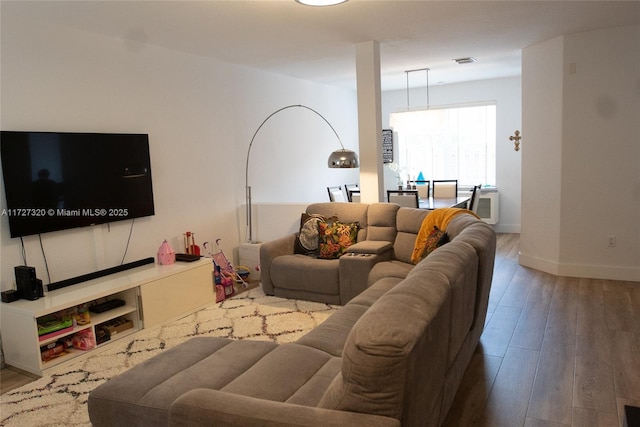 living room with hardwood / wood-style floors