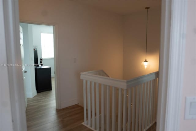 hallway with light wood-type flooring