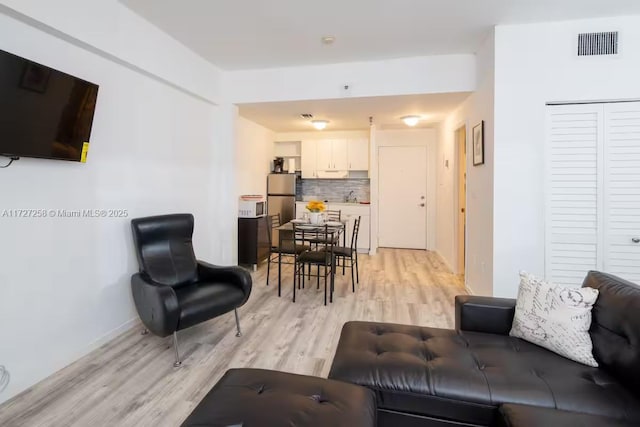 living room featuring light hardwood / wood-style flooring