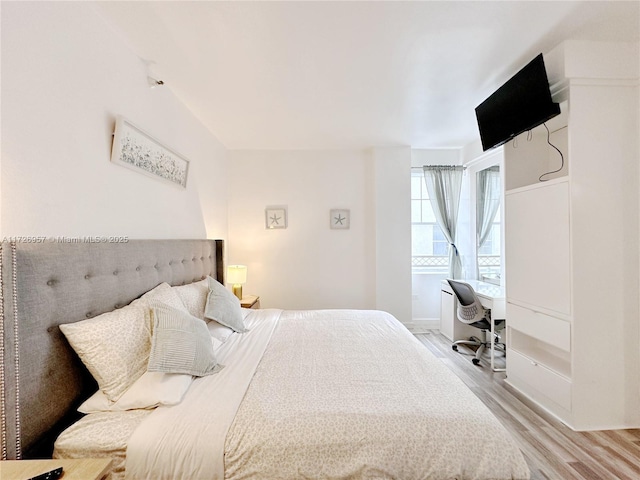 bedroom featuring light hardwood / wood-style flooring