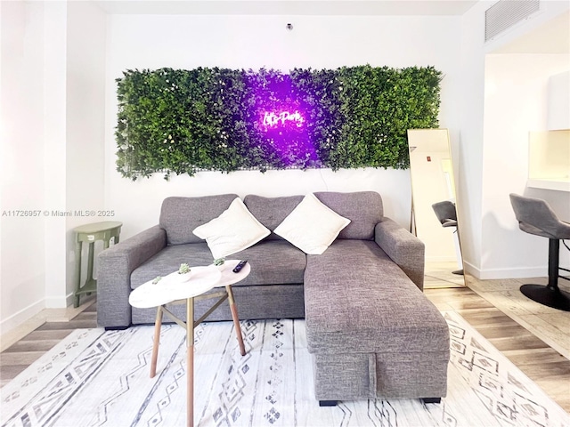 living room featuring hardwood / wood-style floors