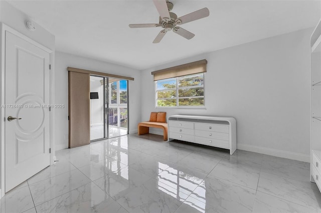 unfurnished room with ceiling fan