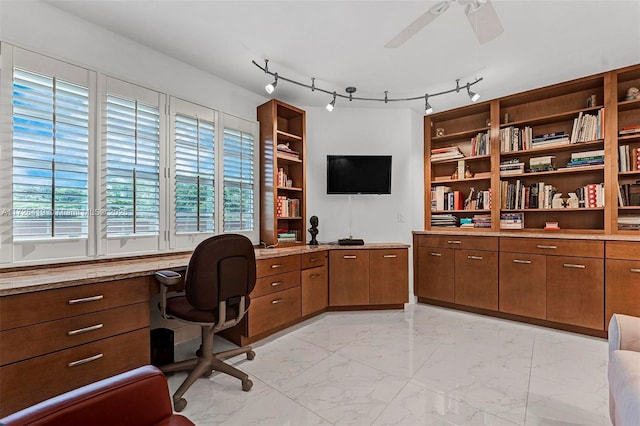 office area with ceiling fan and plenty of natural light