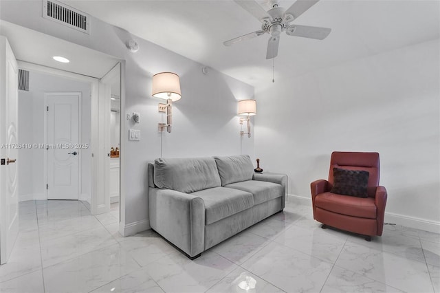 living room featuring ceiling fan