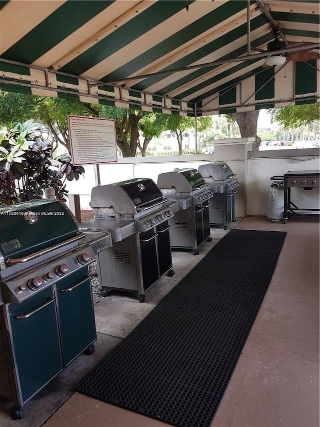 view of patio / terrace featuring grilling area and an outdoor kitchen