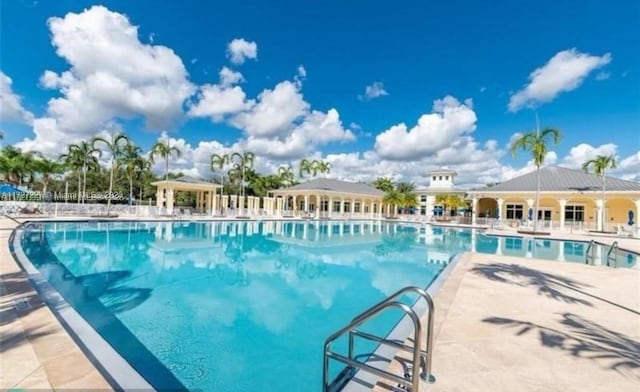 community pool with a patio