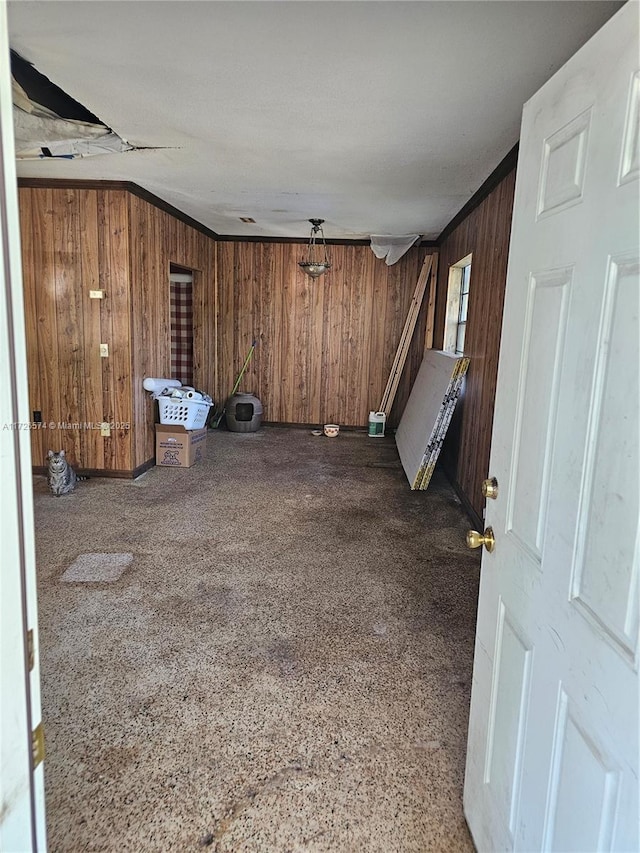 interior space featuring wooden walls