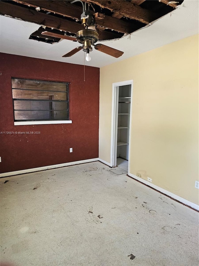 unfurnished room with ceiling fan