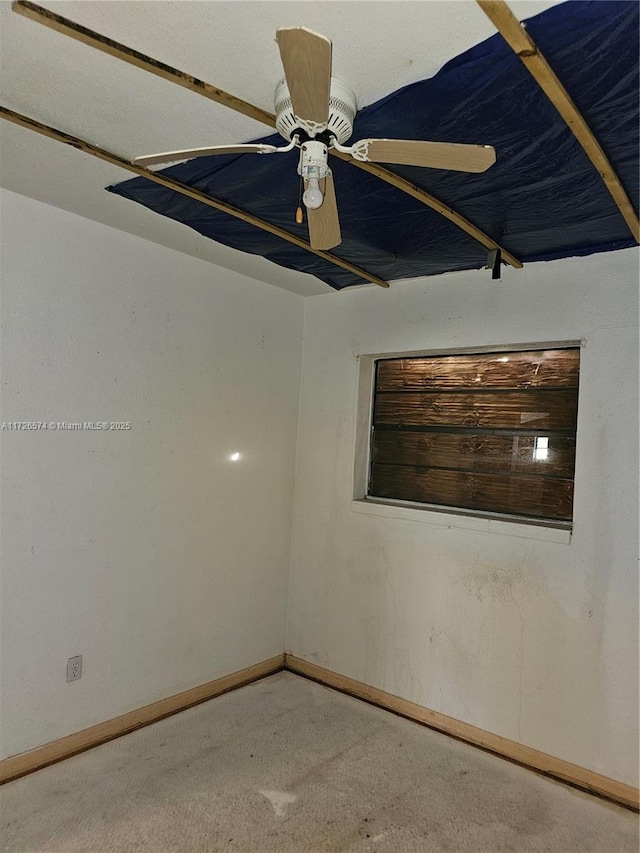 unfurnished room featuring ceiling fan