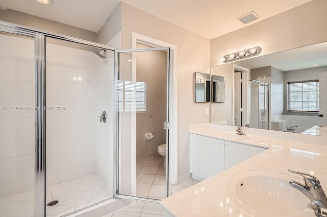 full bathroom with independent shower and bath, toilet, tile patterned floors, and vanity