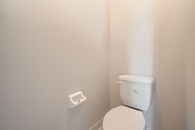 bathroom featuring toilet