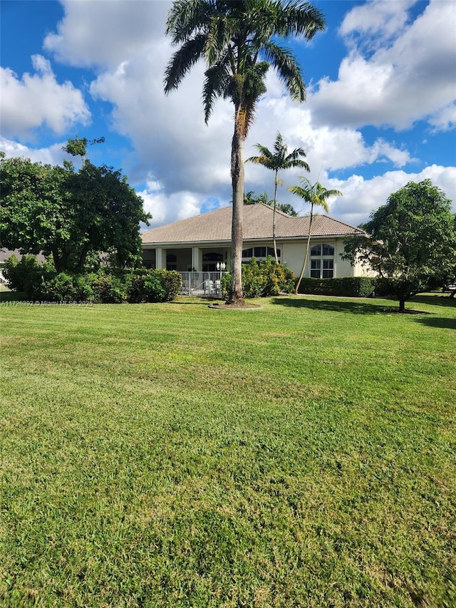 view of front of house with a front lawn