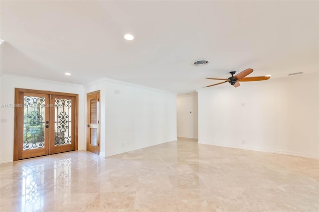 spare room featuring ceiling fan, french doors, and crown molding