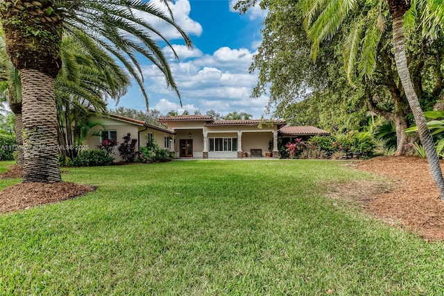 exterior space featuring a lawn