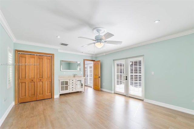 unfurnished bedroom with ceiling fan, access to exterior, ornamental molding, and light hardwood / wood-style floors