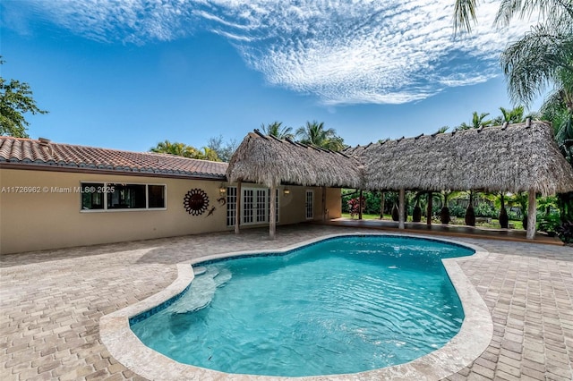 view of swimming pool with a gazebo and a patio