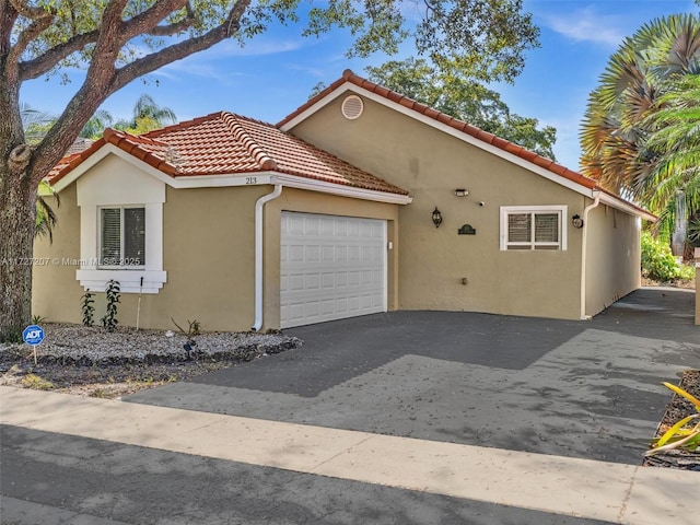 view of front of home featuring a garage