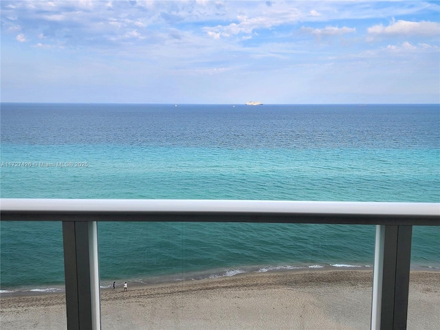 property view of water featuring a beach view