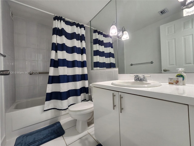 full bathroom featuring tile patterned flooring, vanity, shower / tub combo, and toilet