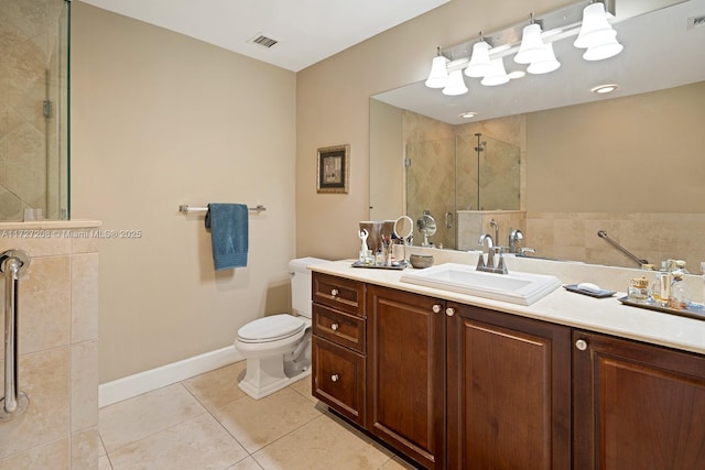 bathroom featuring a shower with shower door, tile patterned floors, vanity, and toilet