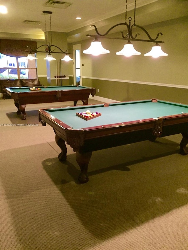 game room with pool table, ornamental molding, and carpet flooring