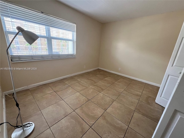 view of tiled spare room