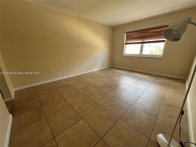 view of tiled spare room