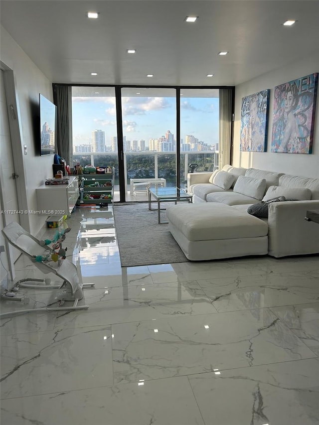 unfurnished living room with floor to ceiling windows