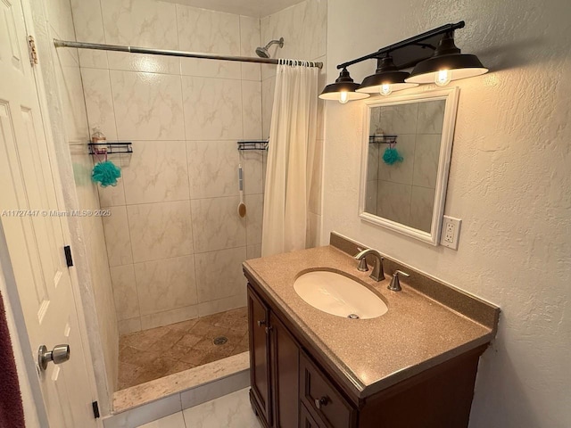 bathroom featuring vanity and a shower with shower curtain