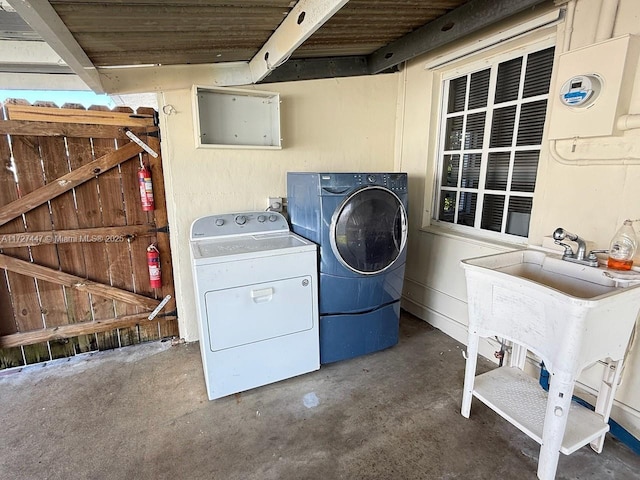 laundry area featuring independent washer and dryer