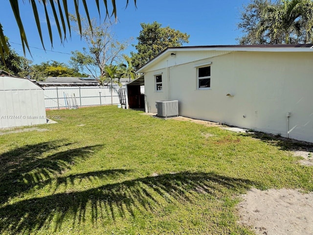 view of yard featuring central AC