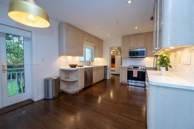 kitchen featuring stainless steel appliances, decorative backsplash, dark hardwood / wood-style flooring, light brown cabinetry, and sink