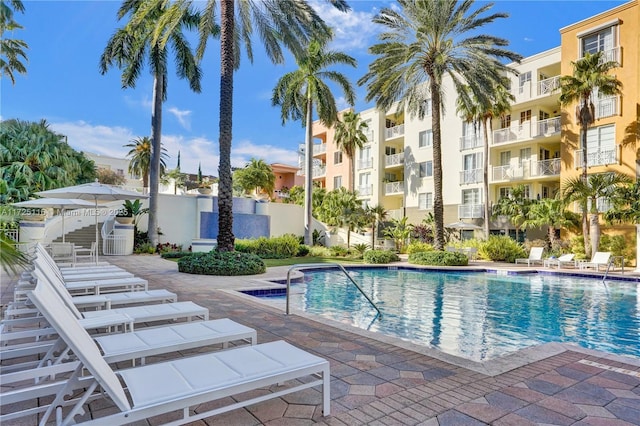 view of swimming pool featuring a patio