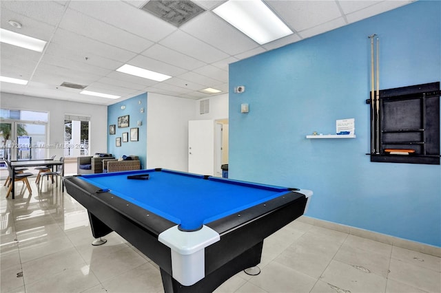 recreation room featuring light tile patterned floors, a drop ceiling, and billiards