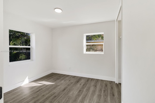 empty room featuring hardwood / wood-style floors