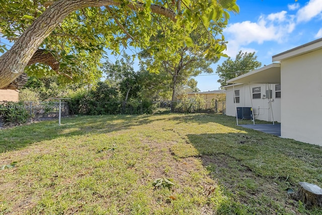 view of yard with central AC unit