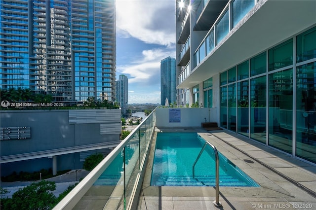 pool featuring a city view