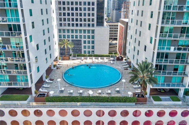 pool featuring a patio area