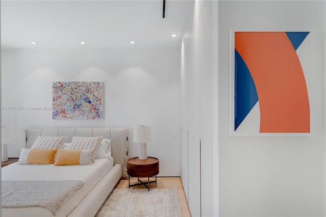 bedroom featuring light hardwood / wood-style floors