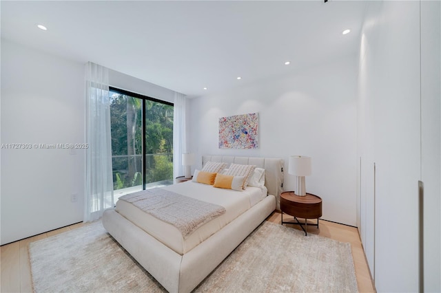 bedroom featuring light hardwood / wood-style flooring