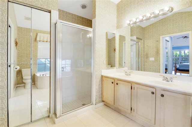 bathroom with toilet, tile patterned flooring, an enclosed shower, and vanity