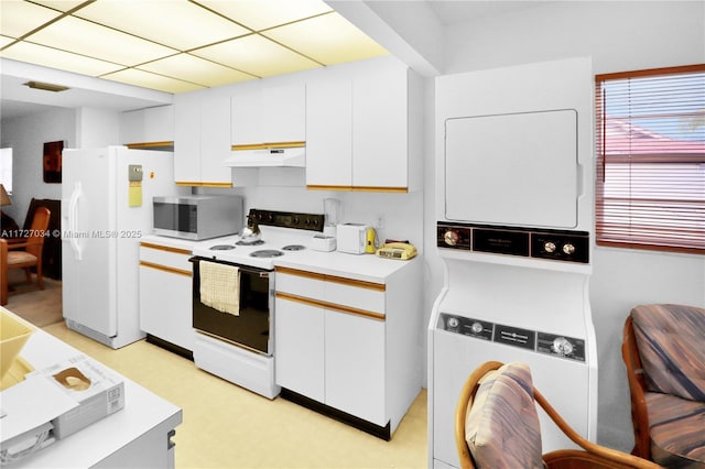 kitchen with white cabinetry, white appliances, and a drop ceiling