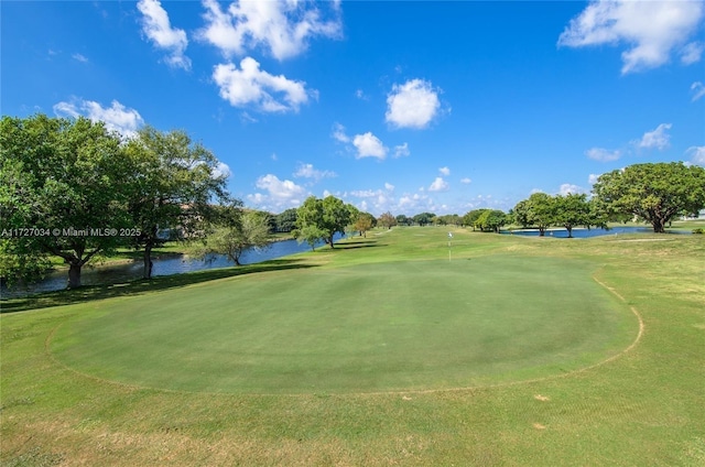 surrounding community featuring a water view