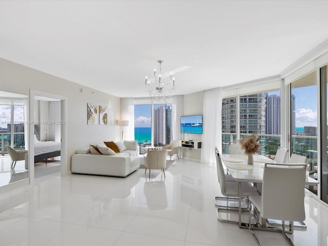 tiled living room featuring an inviting chandelier