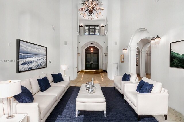 living room with a high ceiling