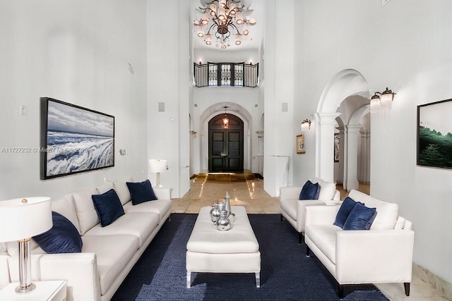 living room with a towering ceiling